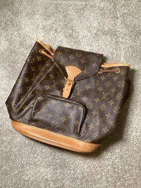 Louis Vuitton Monogram Canvas Drawstring Backpack in Brown and Tan